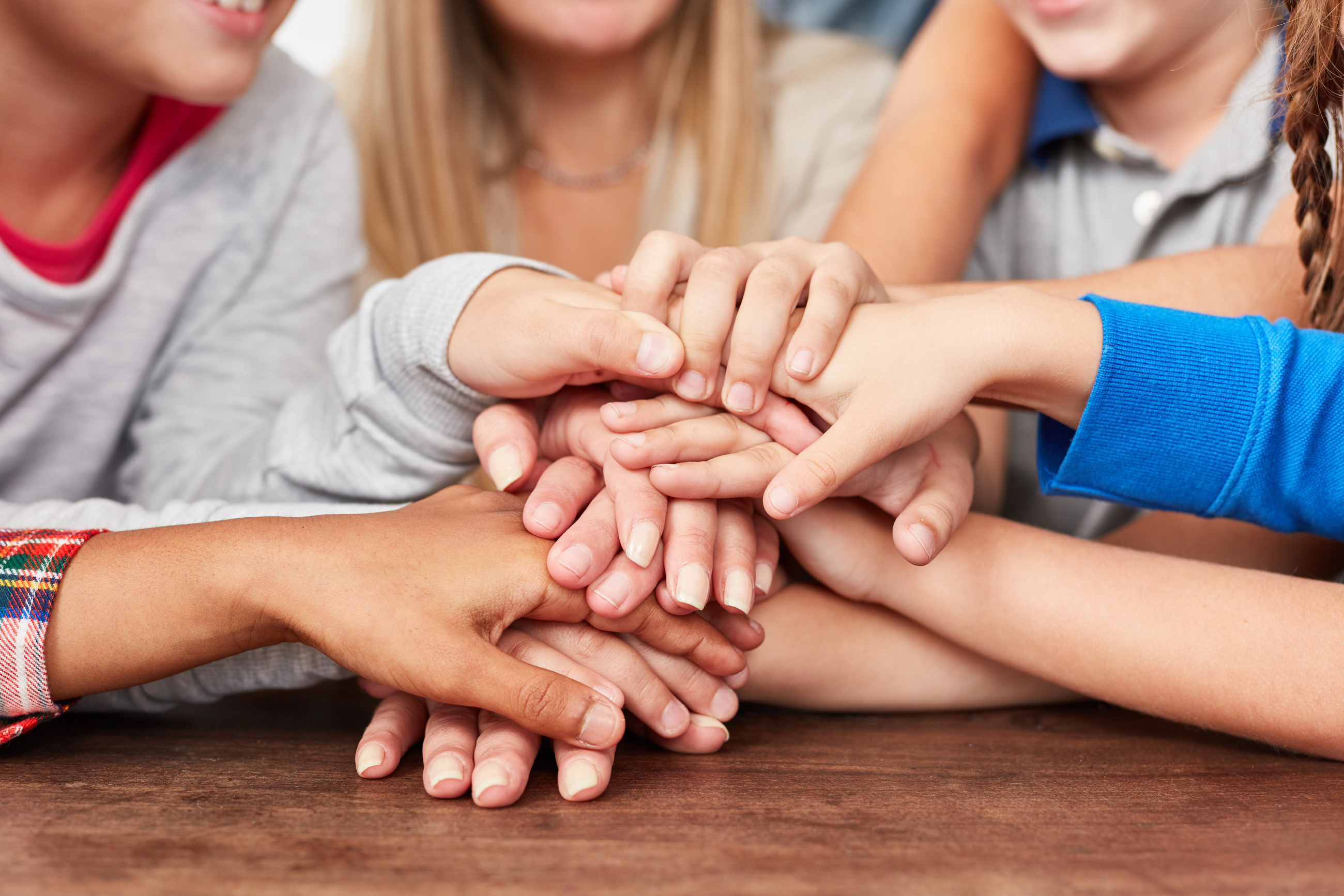Children Stack Hands for Integration